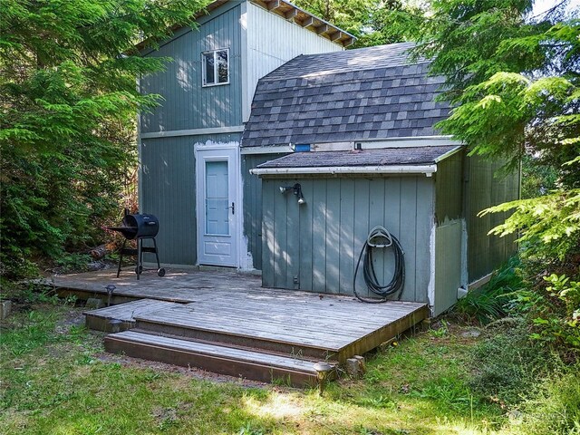 exterior space featuring a wooden deck