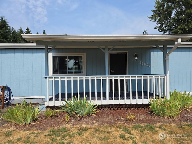 entrance to property with a porch