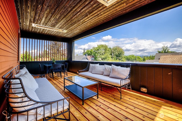 wooden deck featuring an outdoor living space