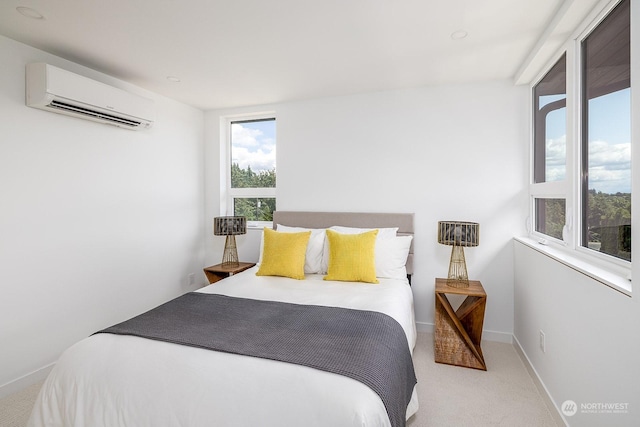 bedroom with light colored carpet and a wall mounted AC