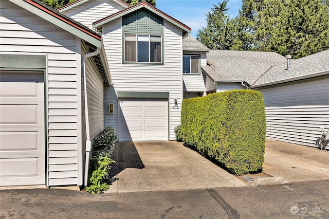 view of front of property featuring a garage