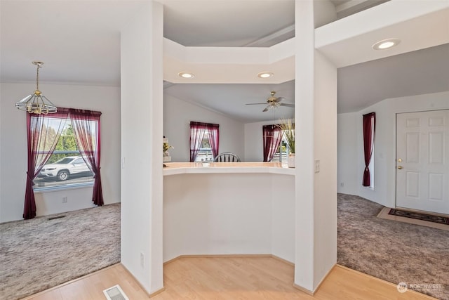 interior space featuring visible vents, a wealth of natural light, and wood finished floors