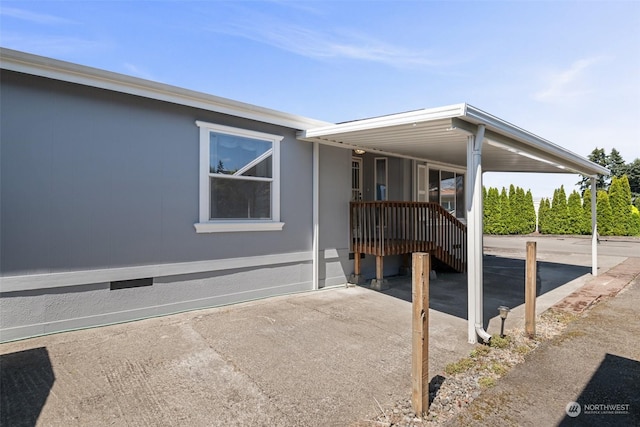 view of patio / terrace with a carport