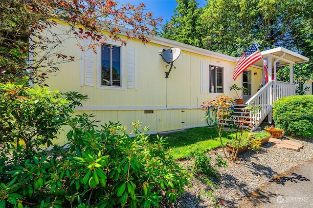 view of home's exterior with crawl space