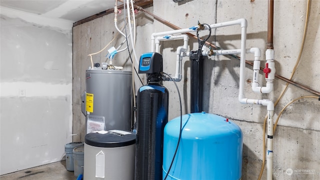 utility room with electric water heater