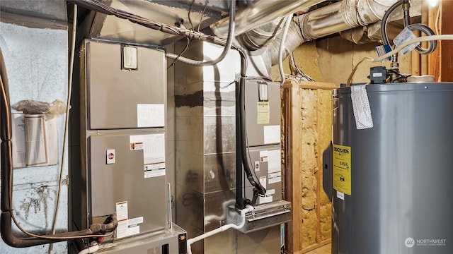 utility room featuring electric water heater