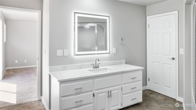 bathroom featuring vanity and tile patterned flooring