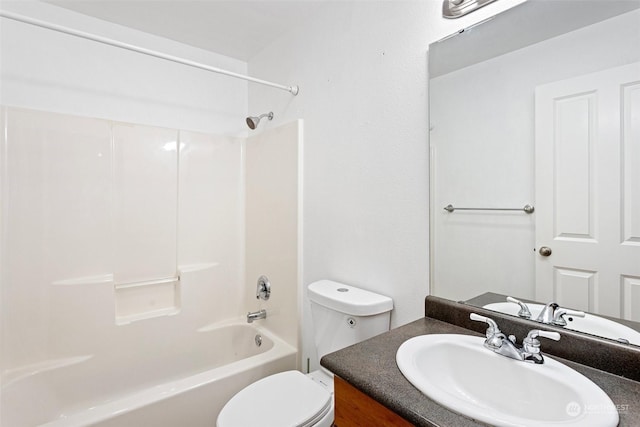 full bathroom featuring vanity, tub / shower combination, and toilet