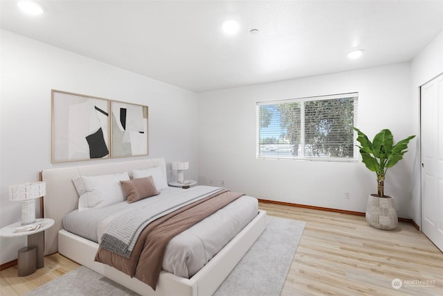 bedroom featuring light hardwood / wood-style floors