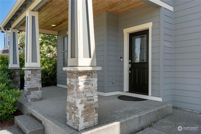 property entrance with a porch