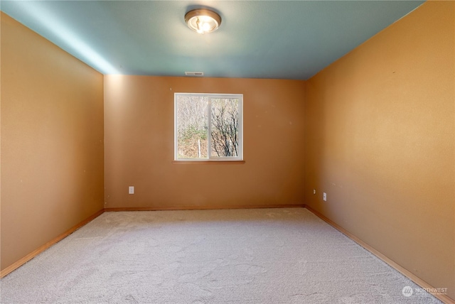 empty room featuring carpet