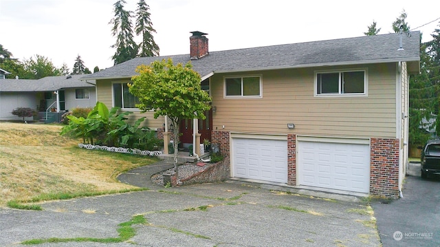 view of front of house with a garage