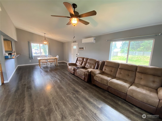 living room with a wall unit AC, vaulted ceiling, ceiling fan, and dark hardwood / wood-style floors