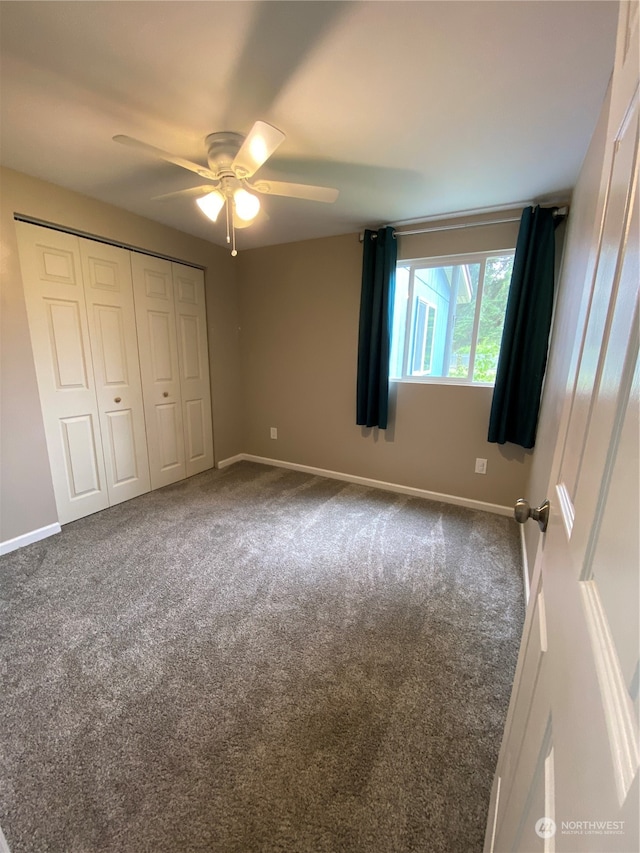 unfurnished bedroom featuring a closet, carpet floors, and ceiling fan