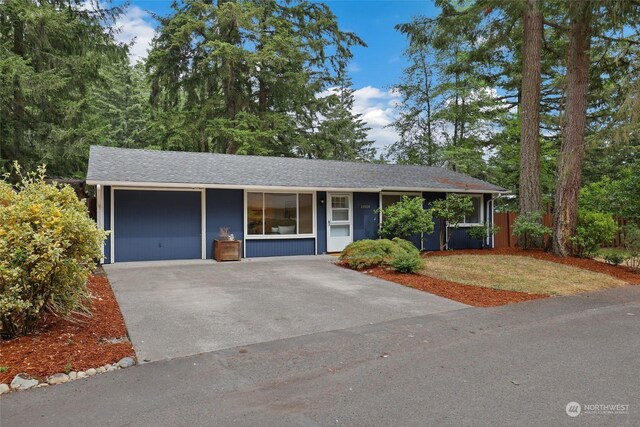 ranch-style home with a garage