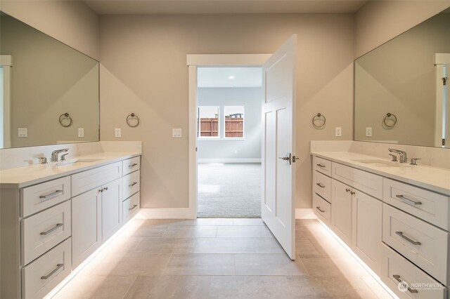 bathroom with vanity and tile patterned floors