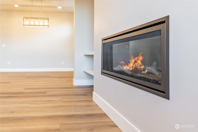 interior details with hardwood / wood-style flooring