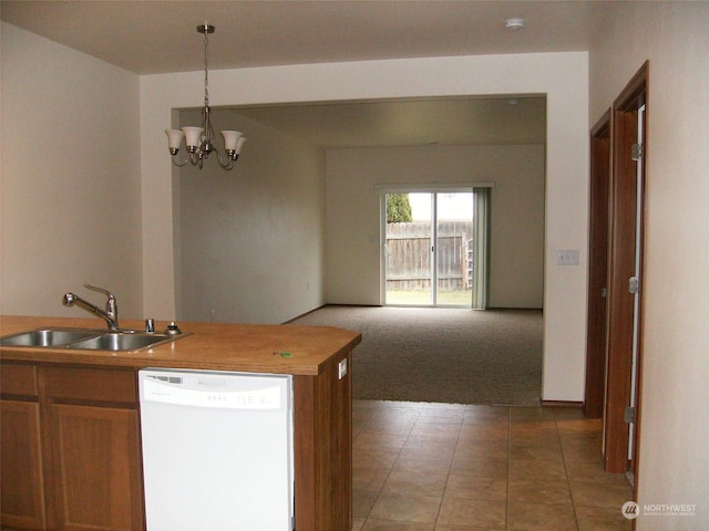 1715 W Bemis St, Moses Lake, WA 98837 - kitchen with light colored carpet, white dishwasher, a sink, a chandelier, and open floor plan