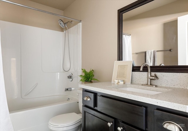 full bathroom featuring vanity, toilet, and shower / bath combo with shower curtain