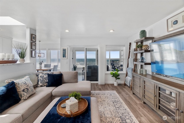 living room with light hardwood / wood-style floors