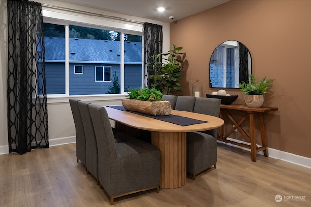 dining area featuring hardwood / wood-style floors