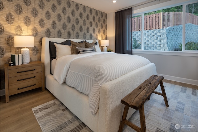 bedroom featuring hardwood / wood-style flooring