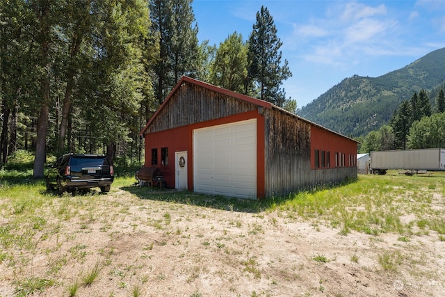 garage featuring a mountain view