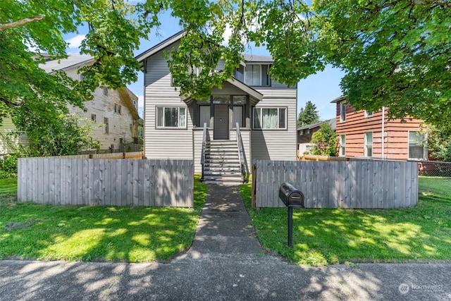 view of front facade with a front lawn