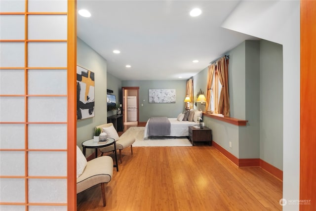 bedroom featuring light hardwood / wood-style floors