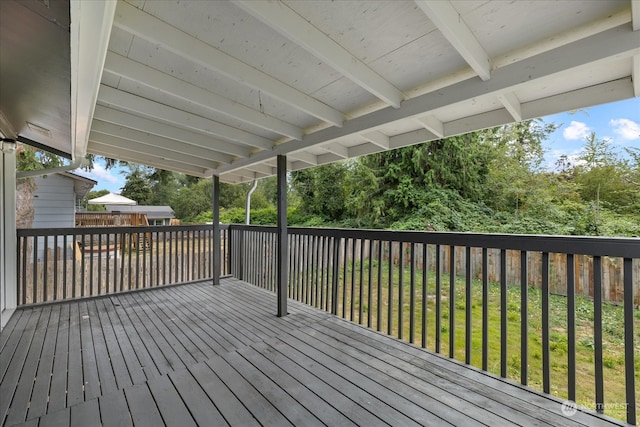 deck featuring a lawn