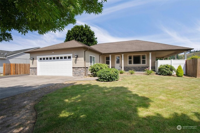 view of front facade featuring a garage and a front lawn