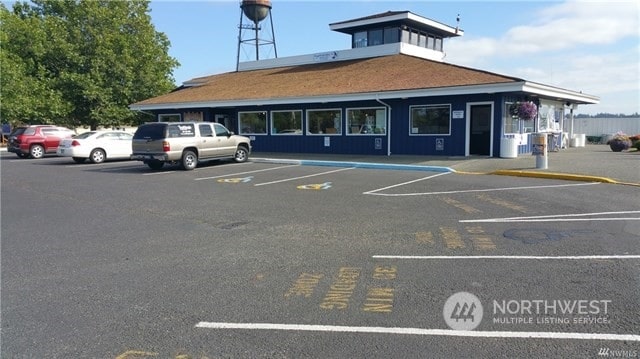 view of parking / parking lot