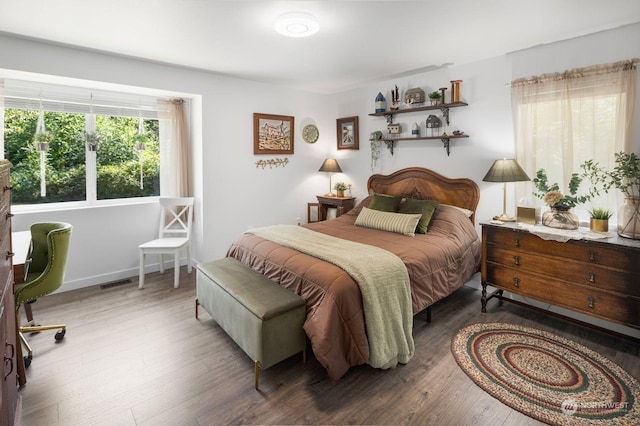 bedroom featuring wood-type flooring