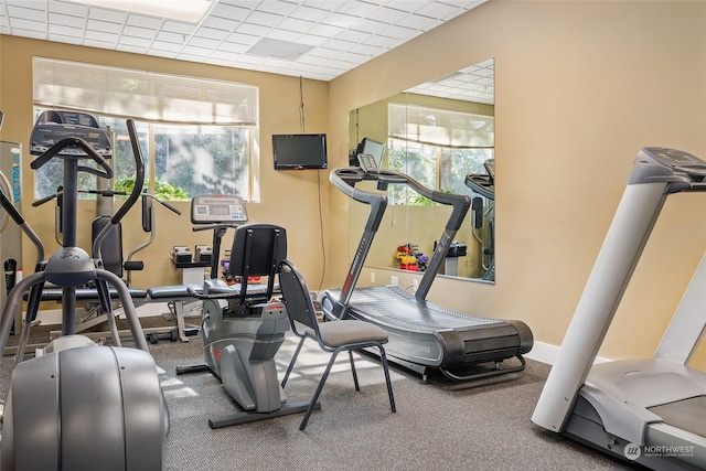 workout room with plenty of natural light