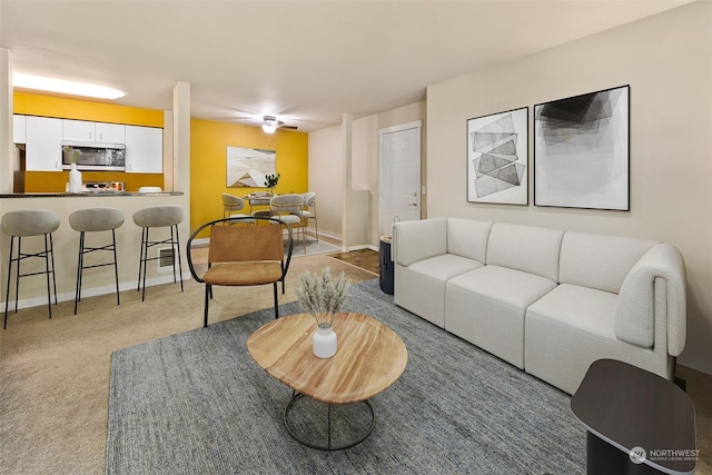 living room featuring carpet floors