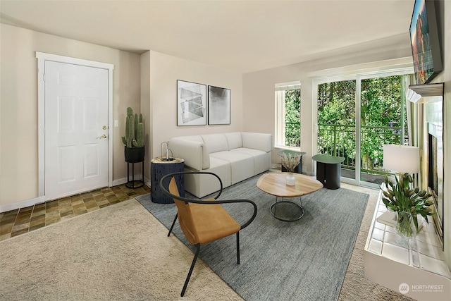 living room with tile patterned flooring