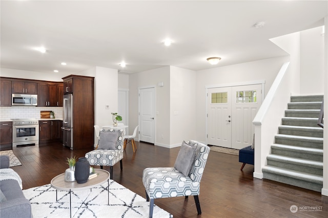 living room featuring dark hardwood / wood-style flooring