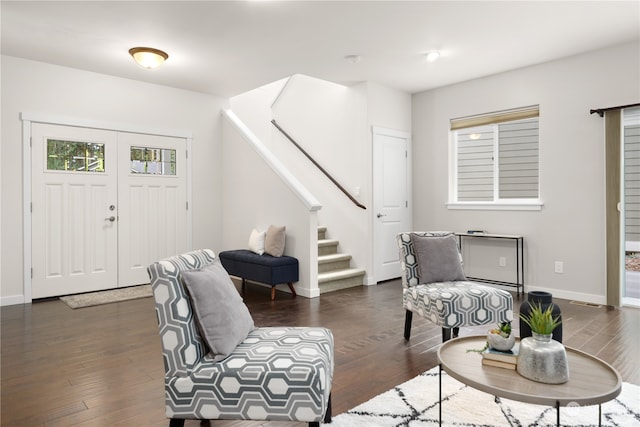 living room featuring dark hardwood / wood-style flooring