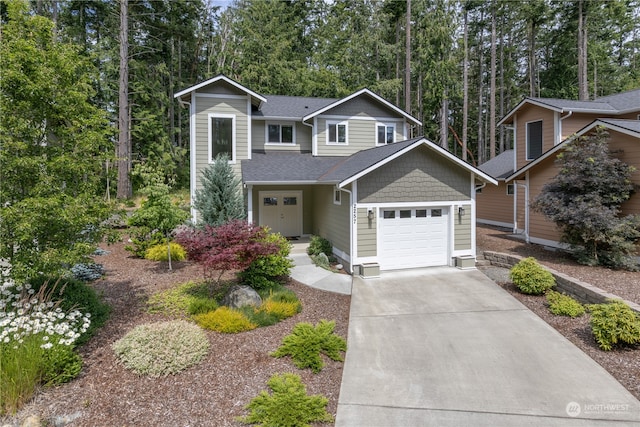 view of front of property featuring a garage