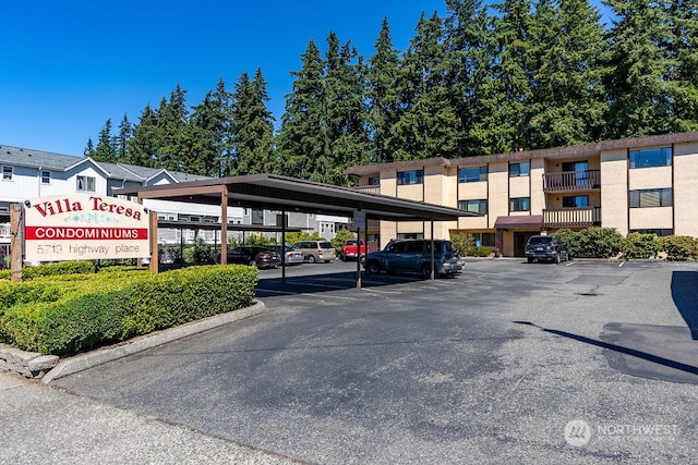 exterior space featuring a carport