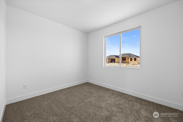 empty room featuring carpet