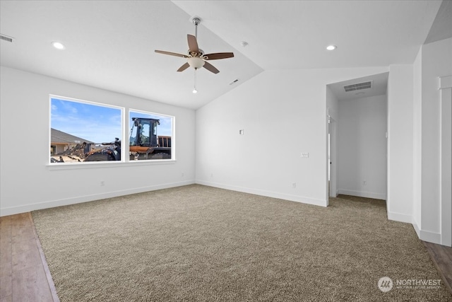 interior space with lofted ceiling, ceiling fan, and hardwood / wood-style flooring