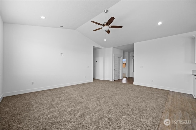 unfurnished bedroom with vaulted ceiling, ceiling fan, and hardwood / wood-style flooring