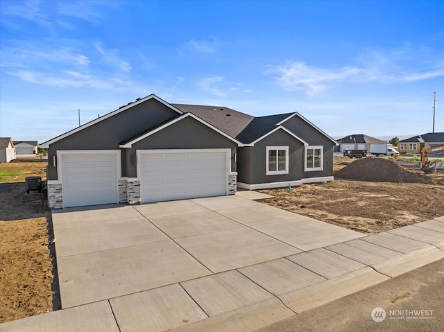 single story home featuring a garage