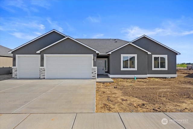 single story home featuring a garage