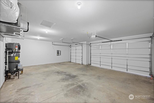 garage featuring a garage door opener, electric panel, and water heater