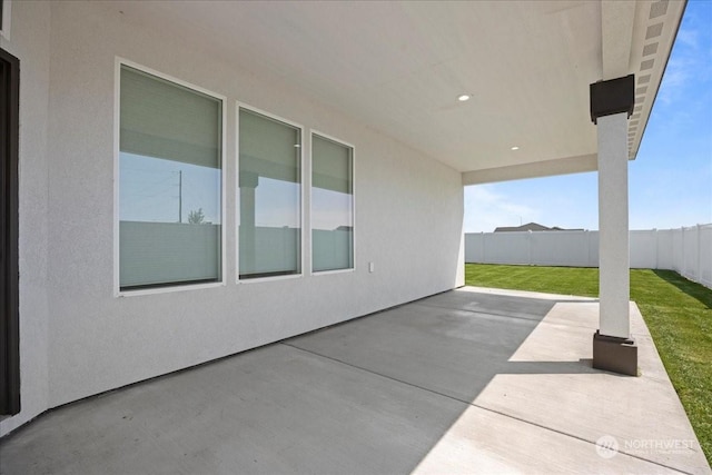 view of patio / terrace with fence