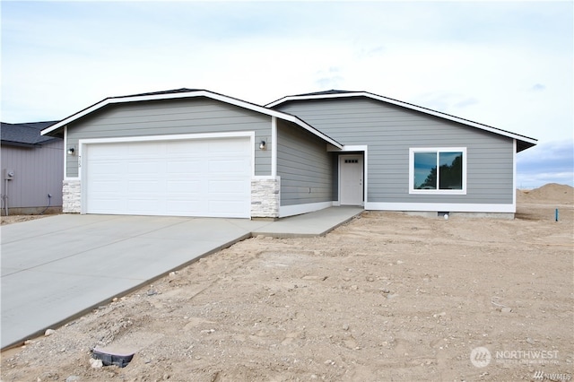 ranch-style home with a garage