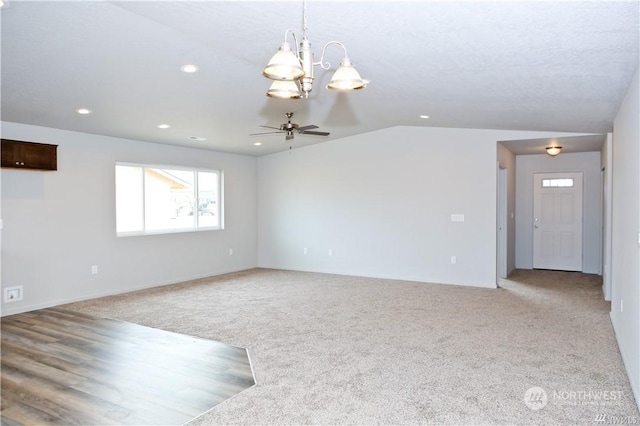 interior space featuring vaulted ceiling, ceiling fan, carpet flooring, and recessed lighting