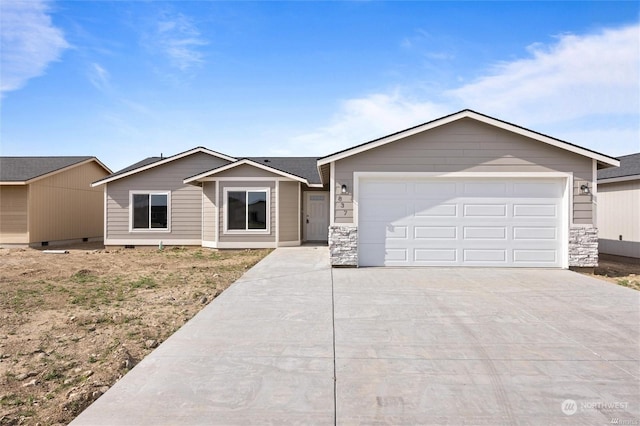 single story home featuring stone siding, concrete driveway, and an attached garage